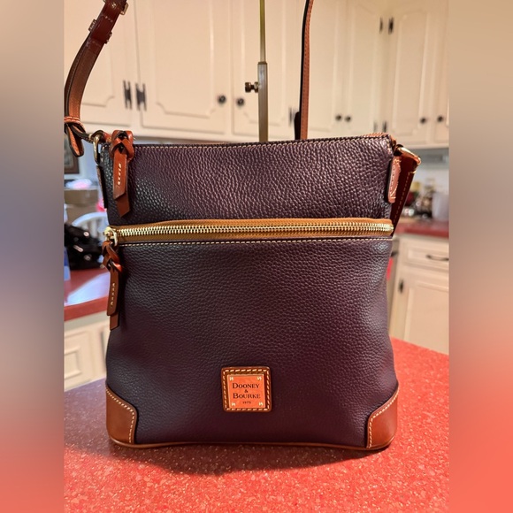 Dooney & Bourke Handbags - Dooney & Bourke Rare Purple Pebbled leather crossbody bag EUC
